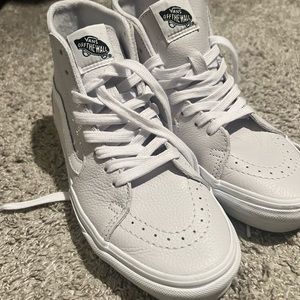 Never been worn high top vans!